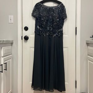 Formal dress worn as mother of groom, lots of beading and sequins. Very elegant